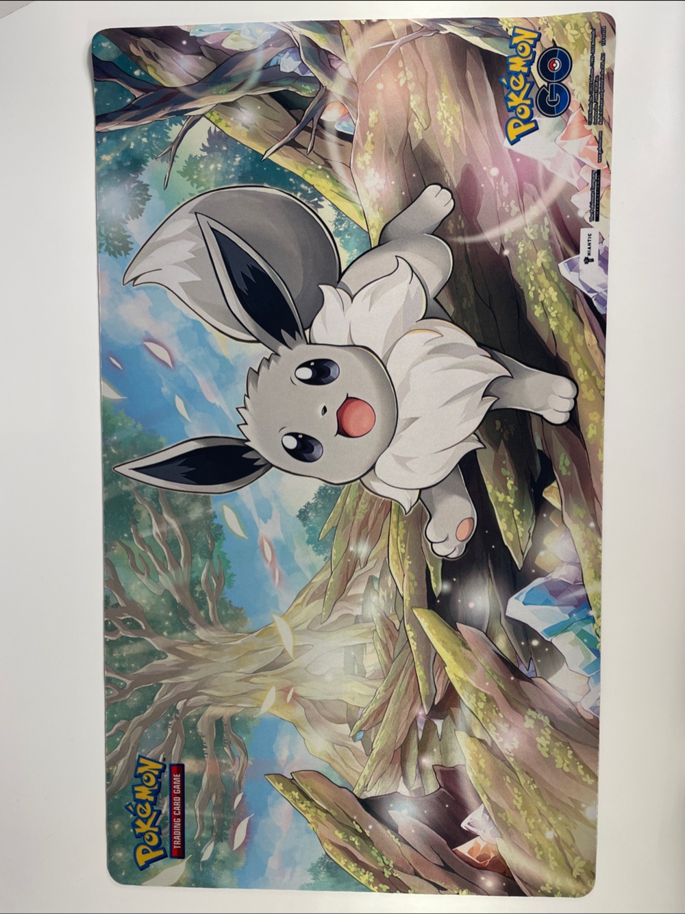 Pokemon Radiant Eevee Table Playmat - Gray, White, Blue, Green Artwork